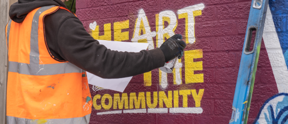 Painting at the HeART of the community mural in Rumney 