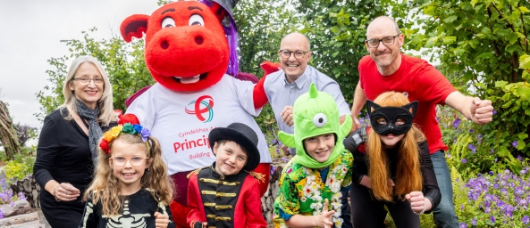 Ty Hafan CEO, Ty Gobaith CEO with Dylan the Dragon James Harper and Friends