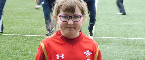 Girl in rugby shirt