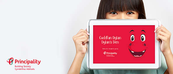 Image of a girl holding a tablet that reads 'Dylan's Den App'